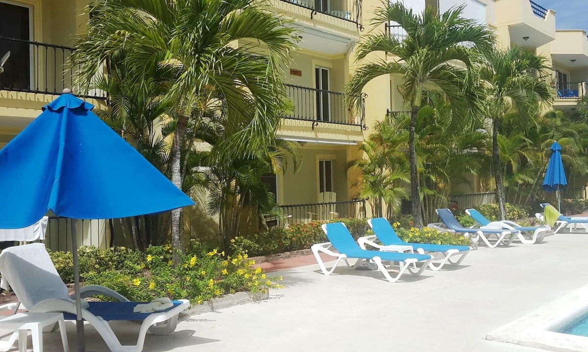 El Batey Apartment | 1BD guest-friendly condo near everything, with pool, wifi, cable TV