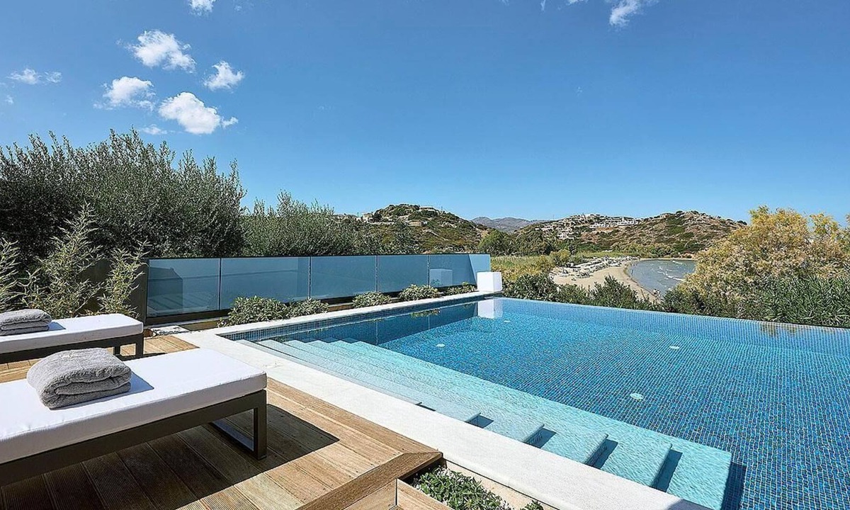 Almyros Villa | Beachfront 2 bedroom villa with a heated pool