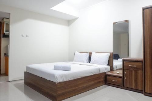Siwalankerto Apartment | Best Value & Spacious Studio Room Apartment at High Point Serviced By Travelio