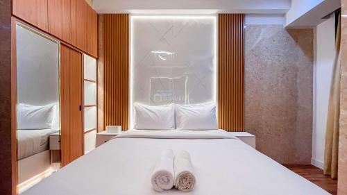 Tetebatu Apartment | Comfortable and Nice Studio Apartment at Delft Ciputra Makassar By Travelio