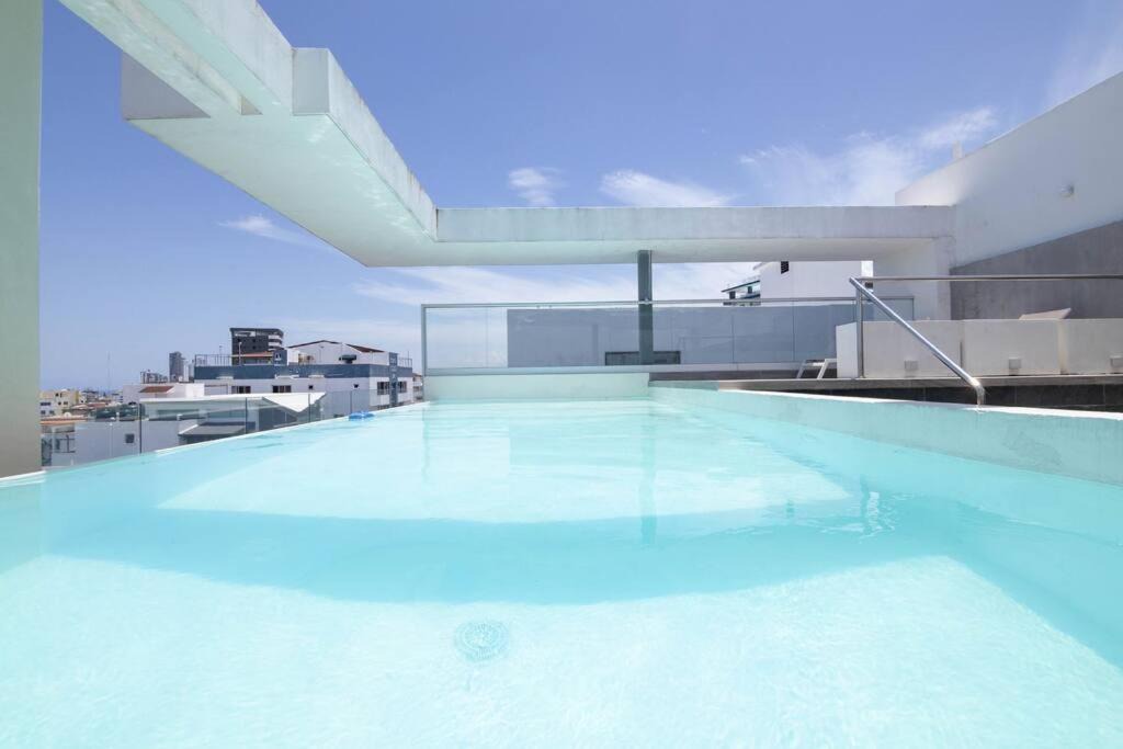 Santo Domingo Apartment | EIrene Cozy Apt 3 BR W/Pool, BBQ and roof Top