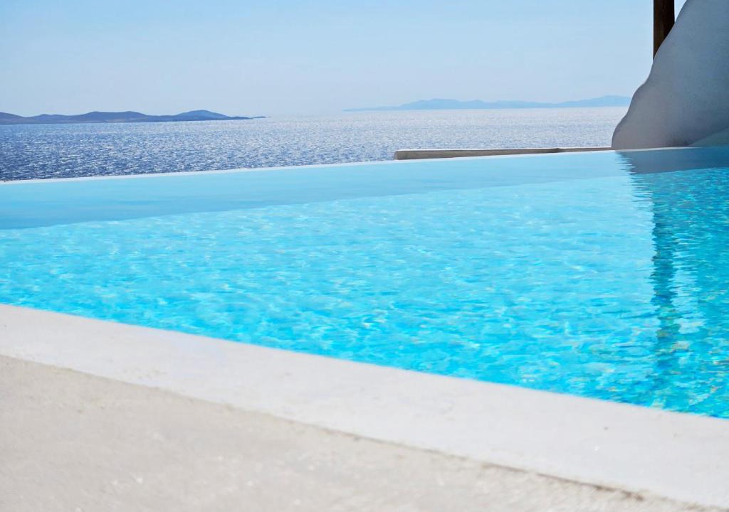Agios Stefanos Apartment | ELLI TROPiCAL LUXURY SUITES SUNSET-INFINITY POOL- SEA SIDE-NEAR CENTER PARKING