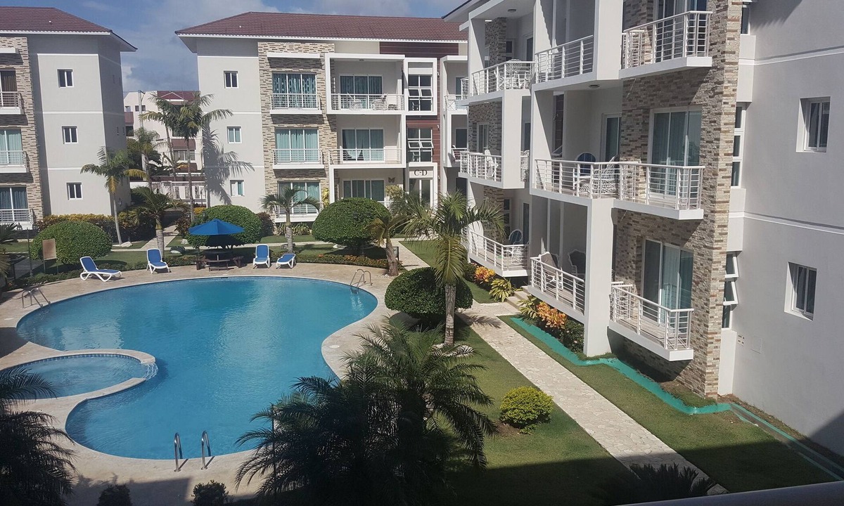 La Esplanada Apartment | Family-friendly 3BD central Sosua condo wih large pool, WIFI, BBQ, A/C, Cable TV