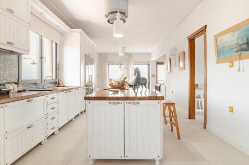 Loutraki Apartment | Front Row to the Beach - Luxury 2BR with Free Parking