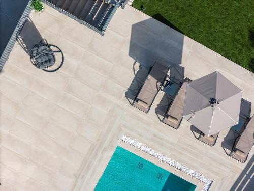 Roumeli Villa | Garde Villa, with Private Pool, BBQ & Playground, By ThinkVilla