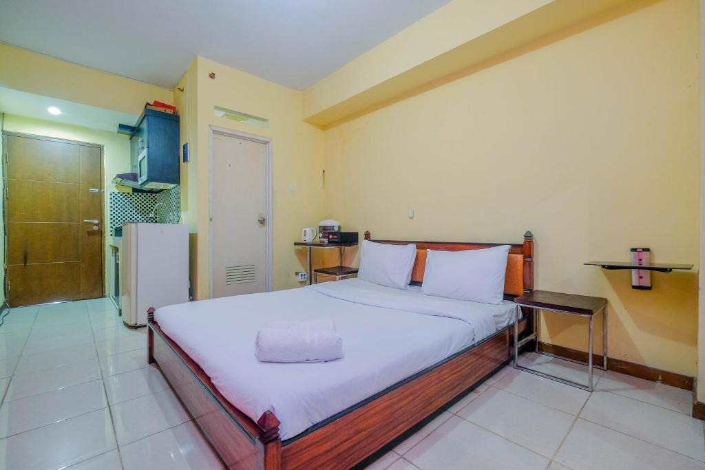 Bogor Apartment | Homey Studio Apartment with Pool View at Bogor Valley By Travelio