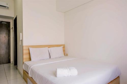 Bumi Serpong Damai Apartment | Homey Studio at Casa De Parco Apartment By Travelio