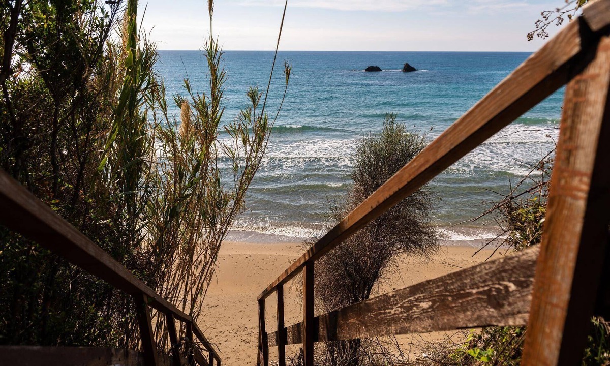 Agios Matthaios House | Idyllically situated and luxurious villa with a veranda and a gazebo