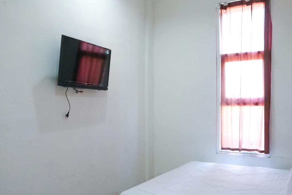 Manado City Centre Hotel | KoolKost @ Tikala Manado (Minimum Stay 6 Nights)