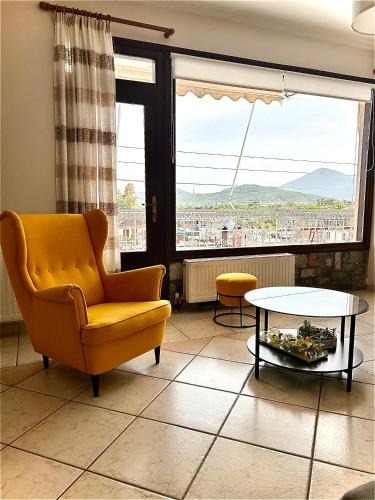 Meligalas Apartment | Lemon & Light Bright Apartment with View and Fireplace