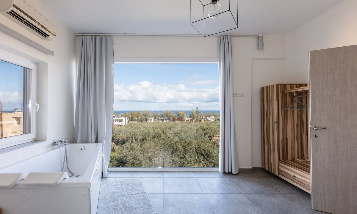 Adelianos Kampos Villa | Minimal Design & Rich Facilities Only 500m Away From Sandy Beach!