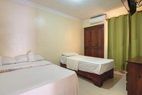 Corales del Sur Apartment | Modern 1-Bedroom Apartment with Private Balcony Fast Wi-Fi Free Parking