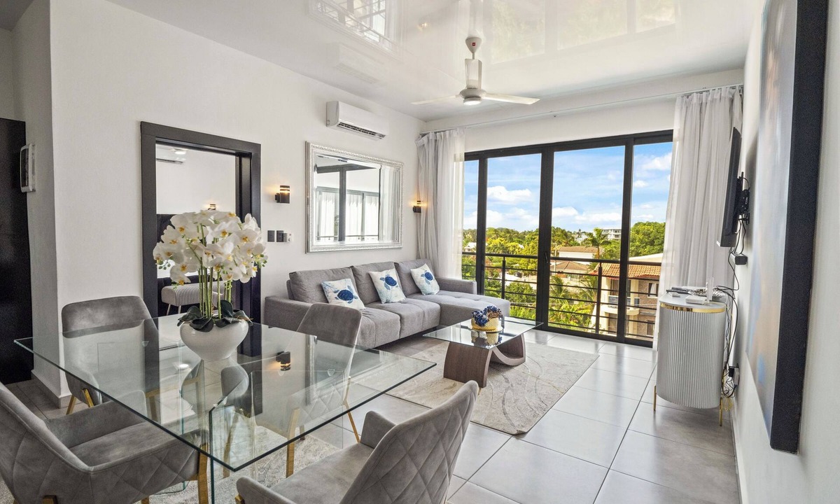 El Batey Apartment | Modern 2BR at Rizz Suites Pool Access Walk to Beach 2 King Beds Sosua