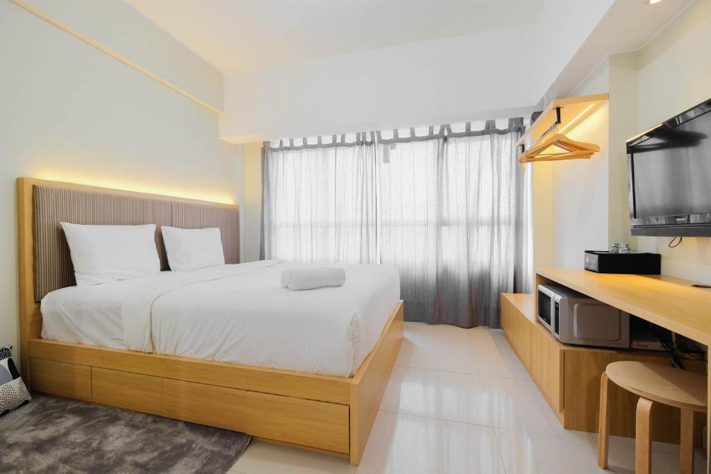 Bekasi Apartment | Modern Studio @ Springlake Summarecon Apartment By Travelio