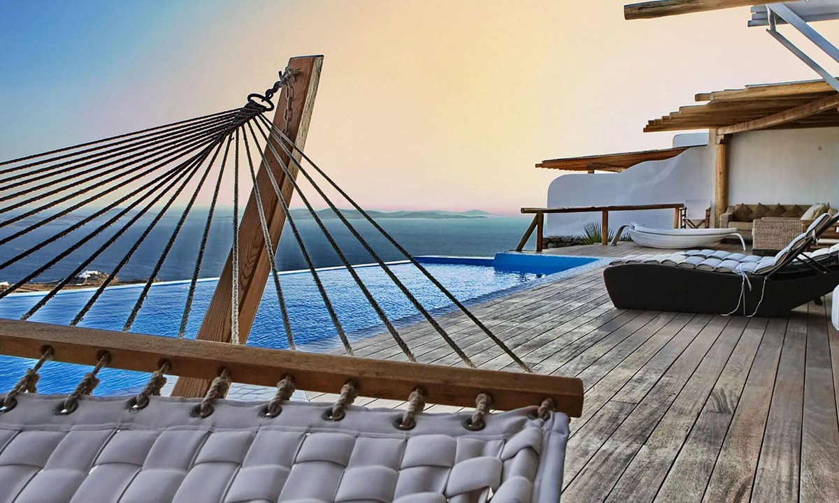 Faros Armenistis Villa | My Rental Homes - Queen Villa with pool area furnished with sunbeds and sea view