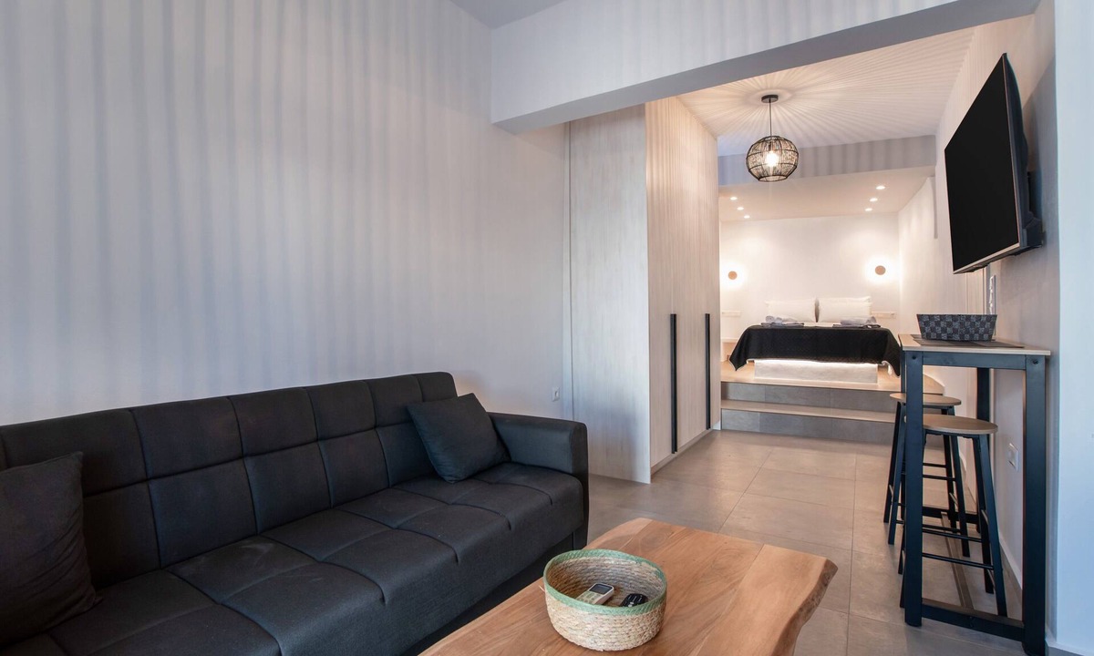 Vivlos Apartment | Næxon Vivlos Grey Roof Apartment with Shared Terrace, Wi-Fi and Air Conditioning