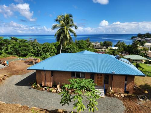 Fare Villa | Potter House VILLA PITA vue sur lagon et village de Fare