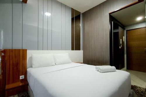 Panakkukang Apartment | Relaxing Studio at Vida View Makassar Apartment By Travelio