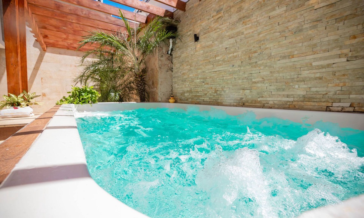 El Batey House | Room in Guest Room - Central Area Bedroom With Common Kitchen, Living Room