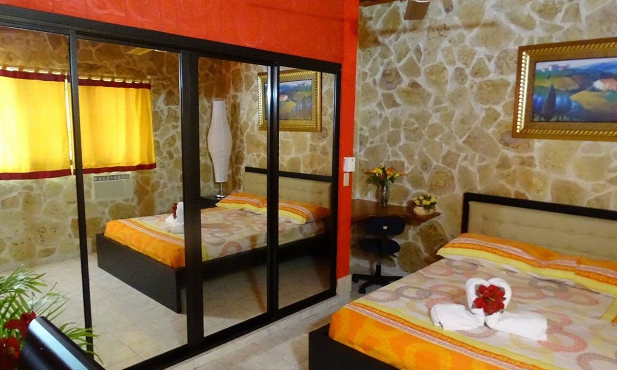 Playa Chiquita Apartment | Room + yummy breakfast, steps from casino/beach, guest-friendly, pool/TV/WiFi