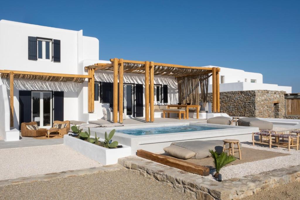 Psarou Villa | Saint L Heated Pool Sunset Villa- Three Bedrooms