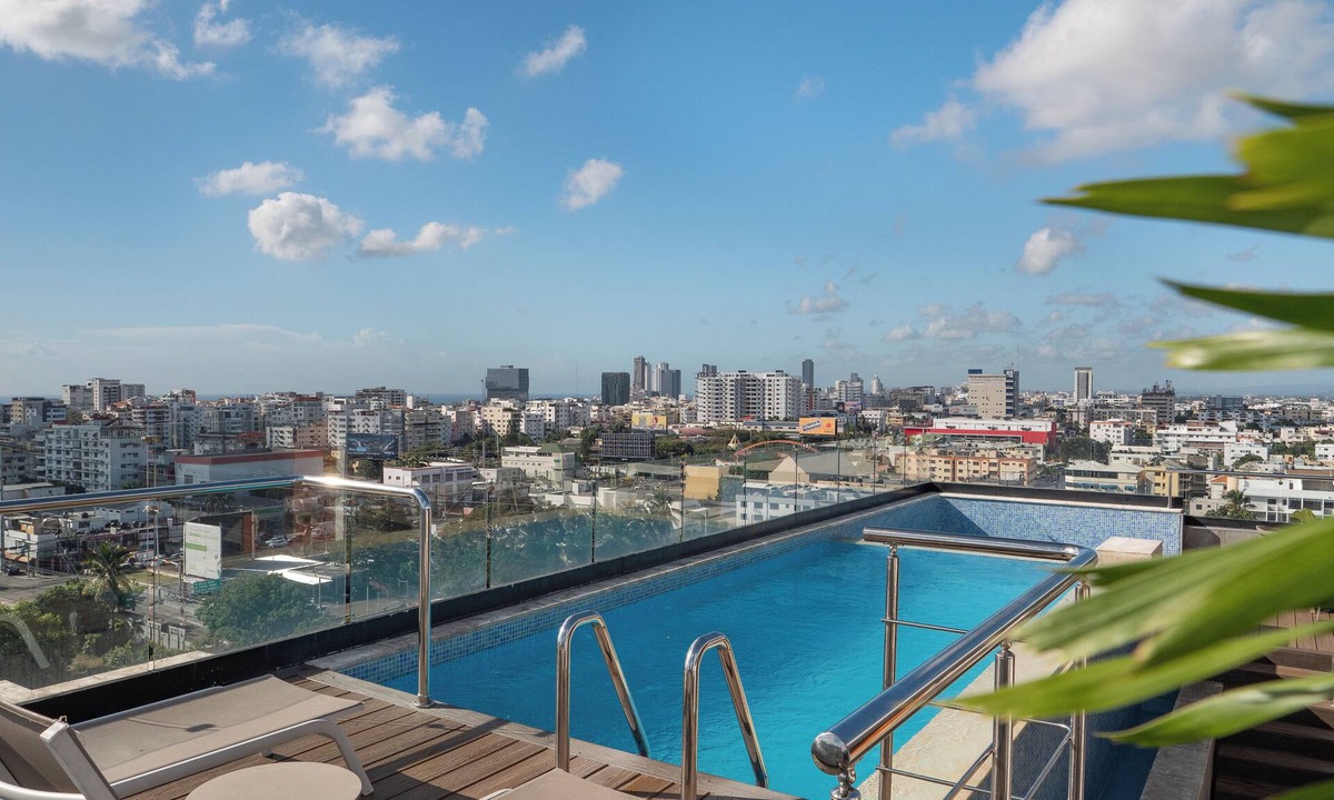 Ensanche Quisqueya Apartment | Spacious 3-bedroom apartment with AC in peaceful Santo Domingo, Pool and Gym