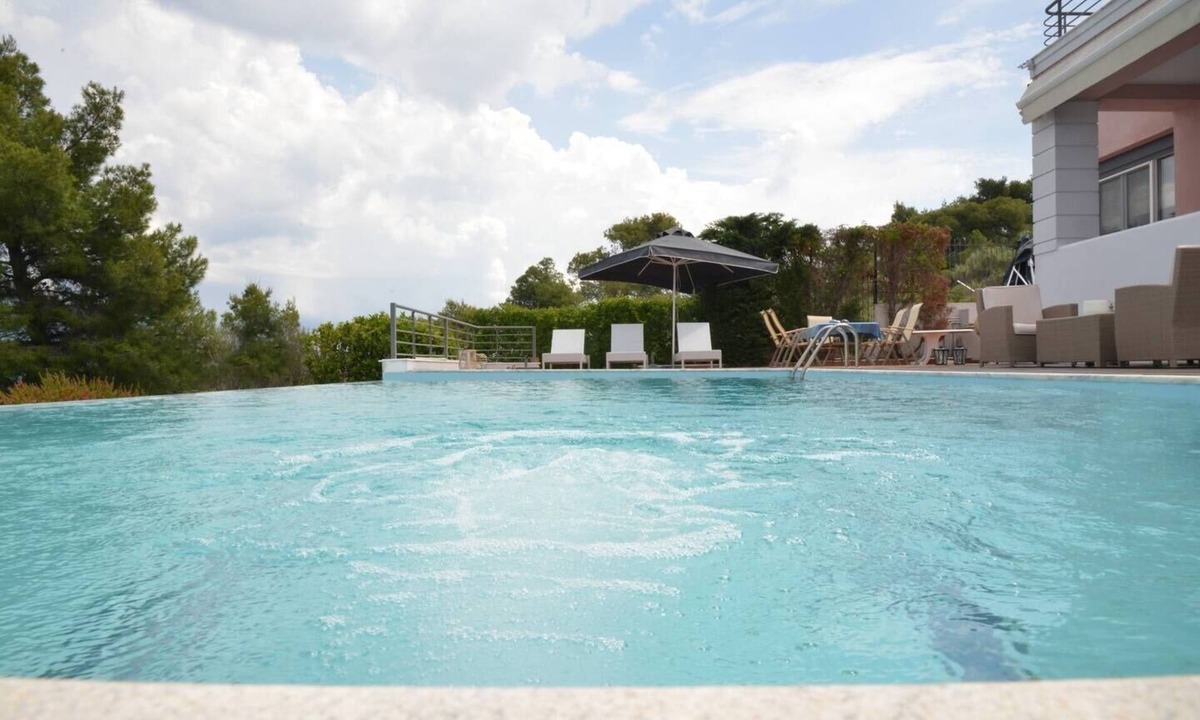 Theologos Villa | This Villa is in a very quite place of the village.There is an excellent seaview
