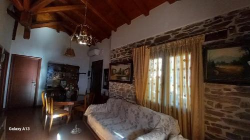 Polygyros Apartment | Traditional Stone House with Modern Renovation