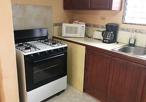 2BD guest-friendly condo opposite main Sosua supermarket, TV/Wi-Fi/pool