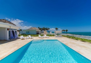 4BD Guest-friendly villa on a sandy beach, private pool & golf cart, gym/tennis!