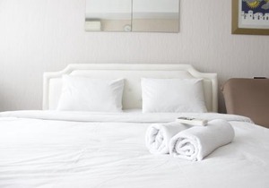 Bright Studio Room at Dago Suites Apartment near ITB By Travelio