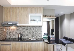Deluxe Studio Room @ Tamansari La Grande Apartment By Travelio