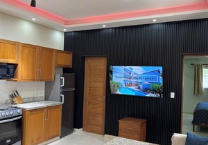 Downtown Sosua One Bedroom Condo with onsite Bar and Cigar Lounge.