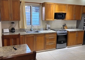 Downtown Sosua One Bedroom Condo with onsite Bar and Cigar Lounge.