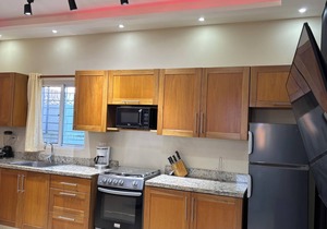 Downtown Sosua One Bedroom Condo with onsite Bar and Cigar Lounge.