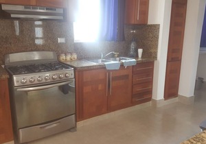 Family-friendly 3BD central Sosua condo wih large pool, WIFI, BBQ, A/C, Cable TV