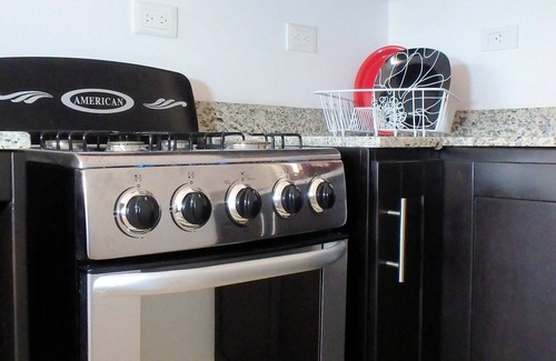 La Mulata Apartment | 1BD condo in countryside resort with pool/Wi-Fi/TV/parking/AC
