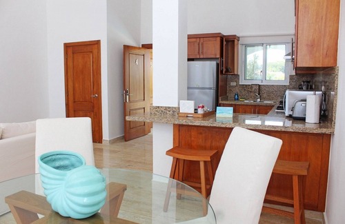 Playa Chiquita Apartment | 1BD guest-friendly condo in beachfront resort, pool/gym/tennis/basket