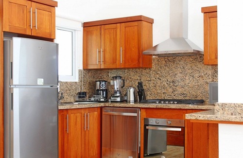 Playa Chiquita Apartment | 1BD guest-friendly condo in beachfront resort, pool/gym/tennis/basket