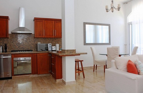 Playa Chiquita Apartment | 1BD guest-friendly condo in beachfront resort, pool/gym/tennis/basket