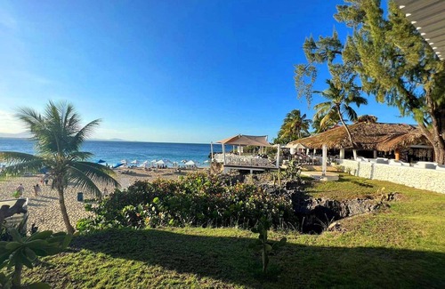 El Batey Apartment | 2BD sea-views condo, guest-friendly, steps from sandy beach and clubs