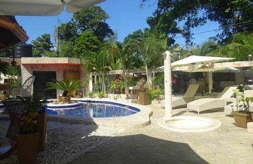 Playa Chiquita Apartment | Budget guest-friendly room near casino and beach
