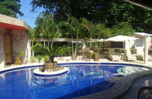 Playa Chiquita Apartment | Budget guest-friendly room near casino and beach