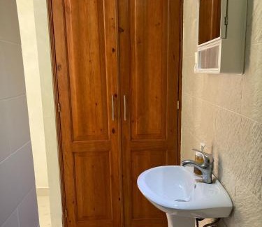 El Batey House | Central Area Bedroom With Common Kitchen, living room
