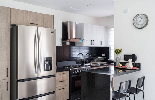 Lope De Vega Condo | City Center Piantini W/Pool, WiFi By YellowKey