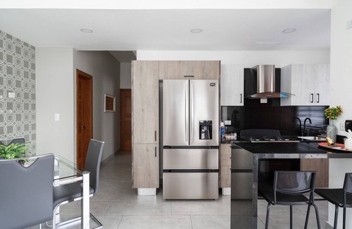 Lope De Vega Condo | City Center Piantini W/Pool, WiFi By YellowKey