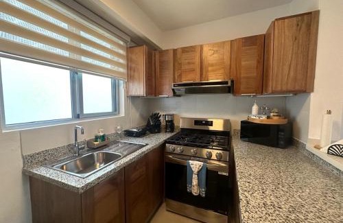La Iglesia Apartment | Luxury 2 Bedroom Apartment, 1 Min Walk to Punta Popy Beach, Pool, AC, Fast WiFi, Las Terrenas