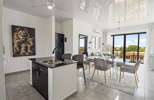El Batey Apartment | Modern 2BR at Rizz Suites Pool Access Walk to Beach 2 King Beds Sosua