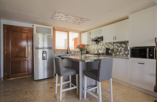El Cortecito Condo | Playa Turquesa K403 200Mbps Private Beach Access Rooftop
