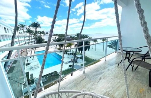 Caribbean Islands Apartment | Presidential Suites in Boca Chica in front of the beach